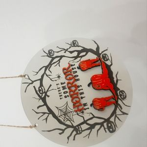 Wall picture frame decorated with pumpkins on Halloween​